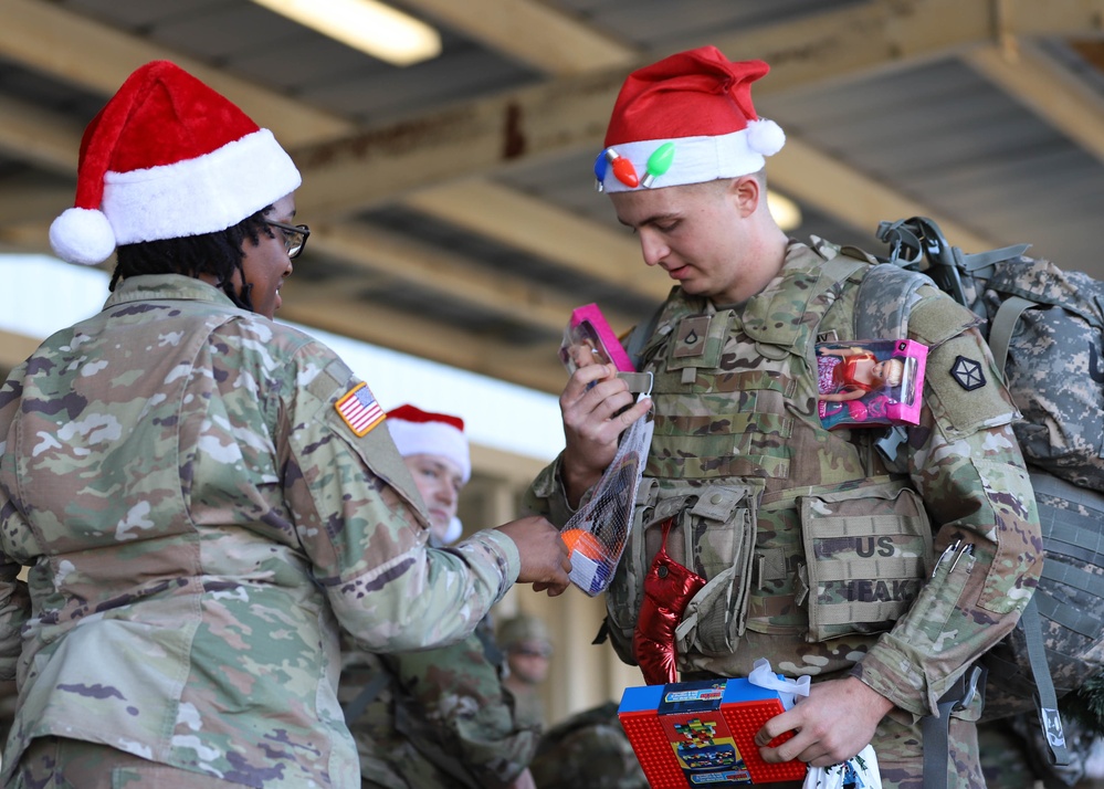 Victory Corps Soldiers March to Deliver Holiday Cheer