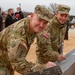 Northwestern Division and Kansas City District commanders sign the beam