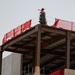 The symbolic lighted tree atop the framed steel construction - Fort Leonard Wood Replacement Hospital Project