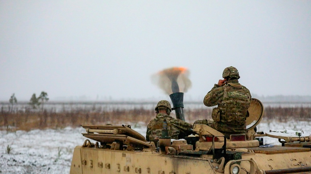 Soldiers with the 3rd Battalion, 66th Armored Regiment conduct direct fire using 120mm mortars at Camp Ādaži, Latvia, during Winter Shield 2021
