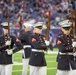 Marines with the Silent Drill Platoon perform during a halftime show at NRG Stadium in Houston, Texas
