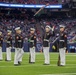 Marines with the Silent Drill Platoon perform during a halftime show at NRG Stadium in Houston, Texas
