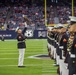 Marines with the Silent Drill Platoon perform during a halftime show at NRG Stadium in Houston, Texas