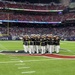 Marines with the Silent Drill Platoon perform during a halftime show at NRG Stadium in Houston, Texas