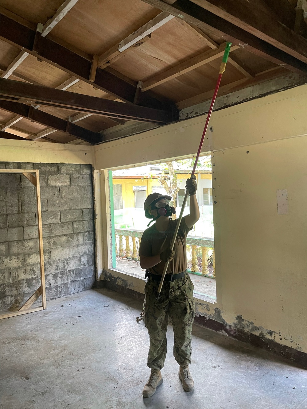 US Navy Seabees with NMCB-5 build a schoolhouse with the Armed Forces of the Philippines