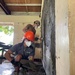 US Navy Seabees with NMCB-5 build a schoolhouse with the Armed Forces of the Philippines