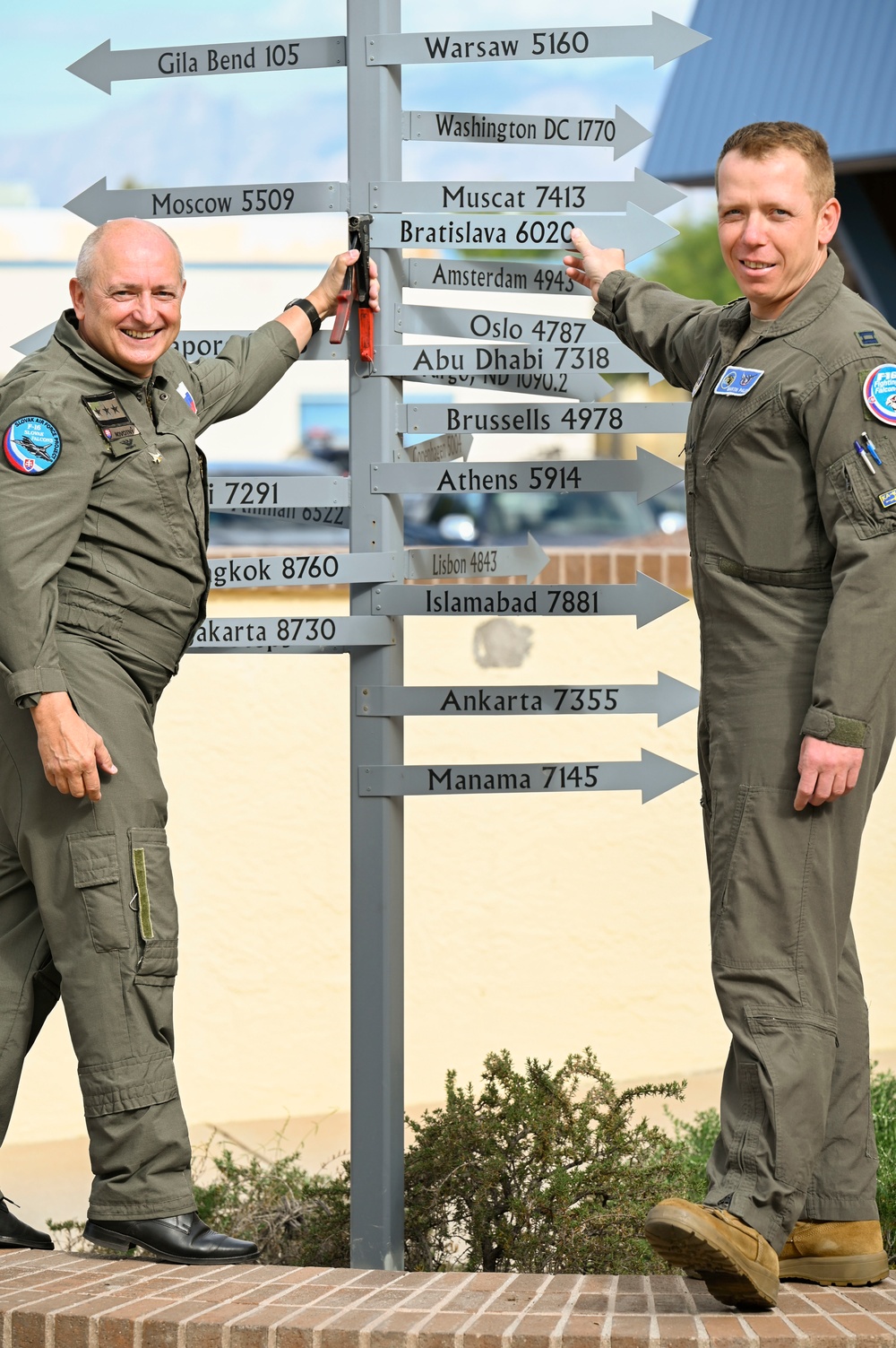 Student Pilots Add Mileage Marker to Wing Flagpole