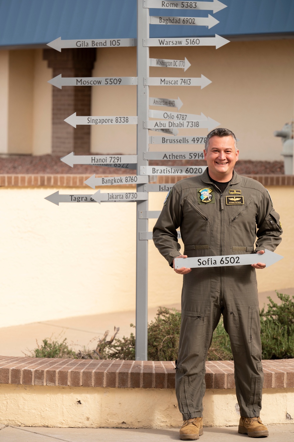 Student Pilots Add Mileage Marker to Wing Flagpole
