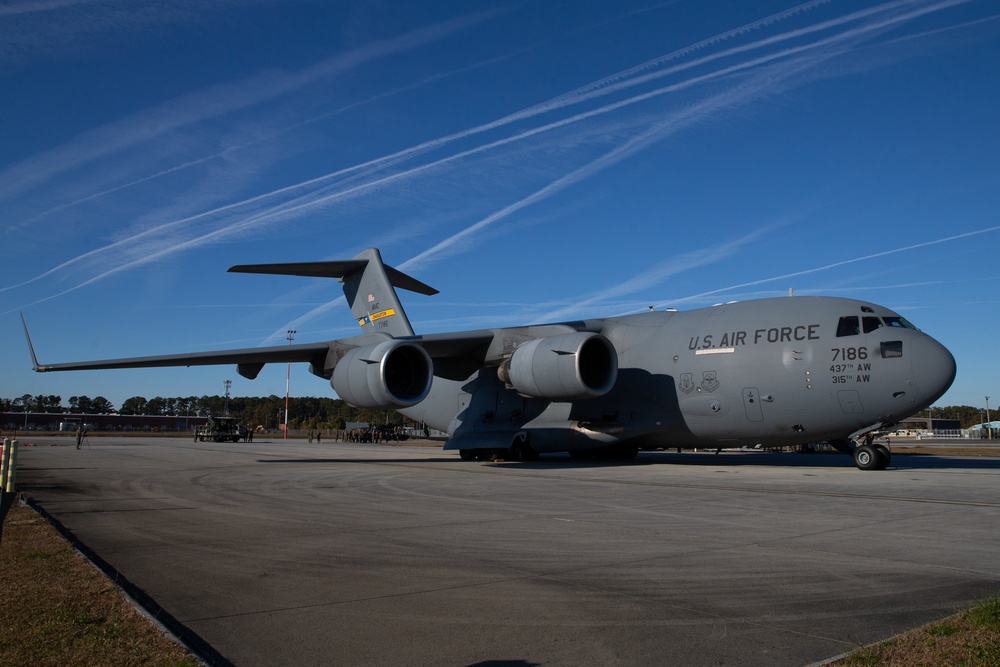 Marines and Airmen Load C-17