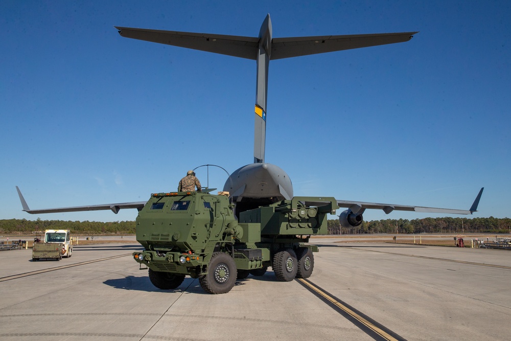 Marines and Airmen Load C-17