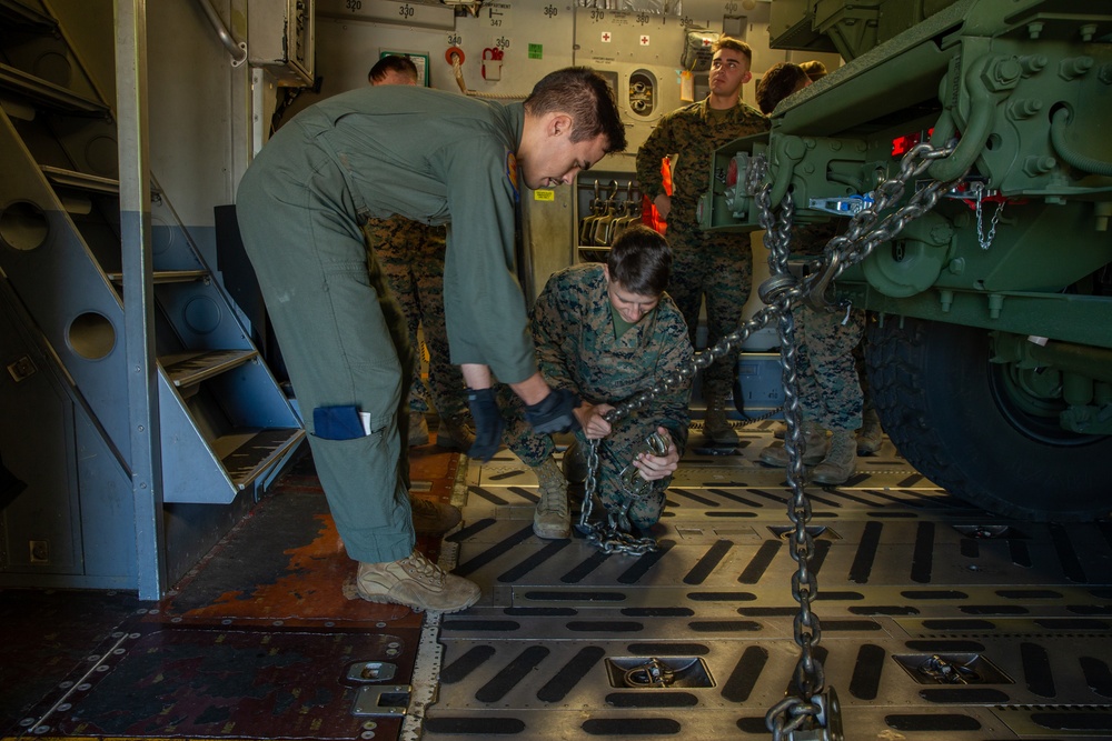 Marines and Airmen Load C-17