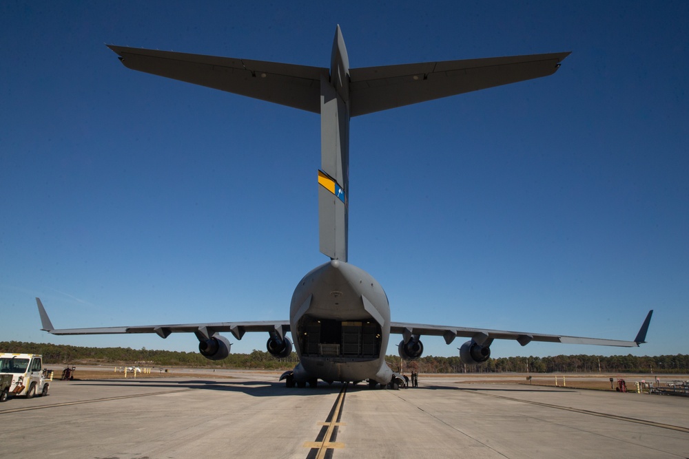 Marines and Airmen Load C-17