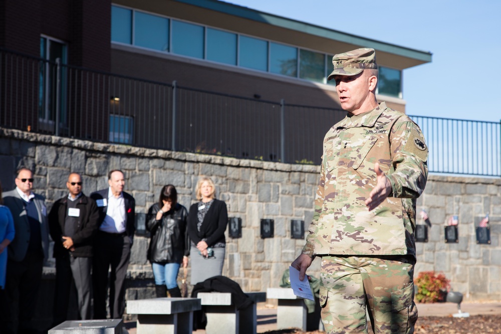 TAG kicks off tour at memorial wall