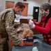 Volunteers give a taste of home to Airmen, families