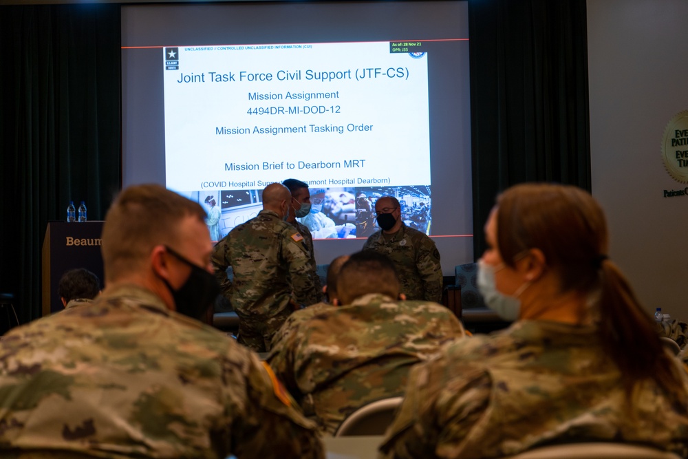 U.S. Army Medical Response Team arrives, begins integration with Beaumont Hospital, Dearborn.