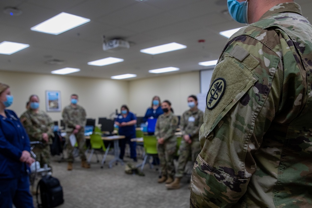 U.S. Army Medical Response Team arrives, begins integration with Grand Rapids, Michigan hospital