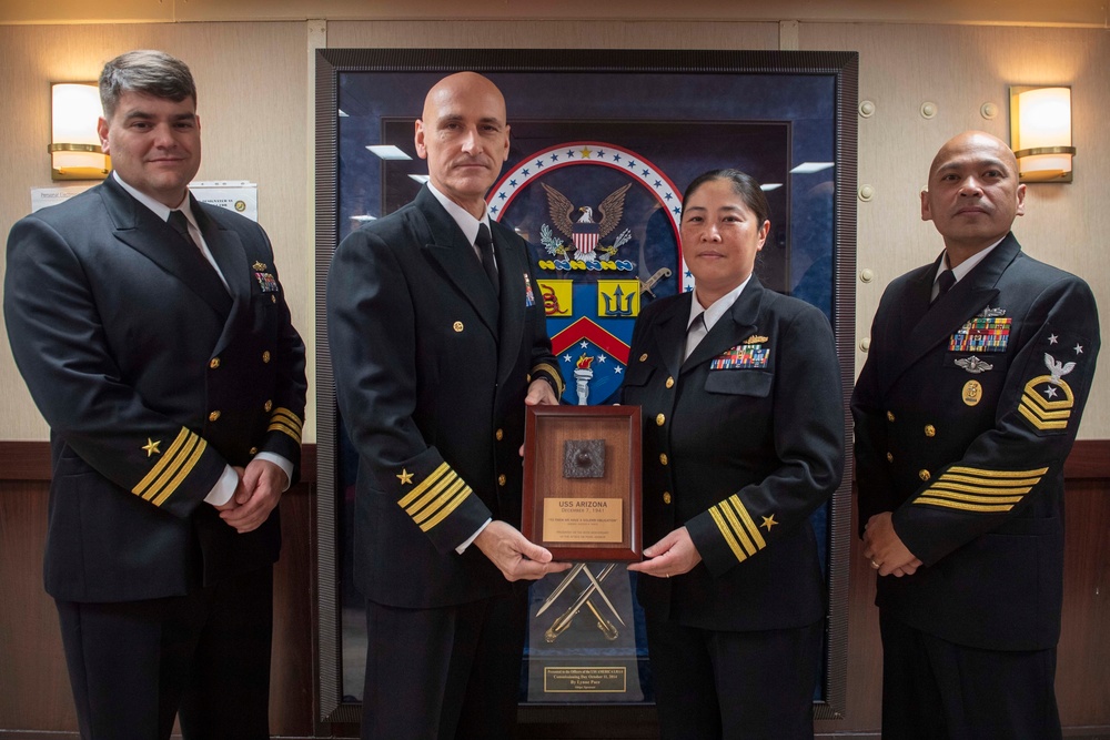 Amphibious Squadron 11 presents USS Arizona relics to ships