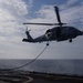 USS Lake Champlain conducts in-flight refueling drills in Philippine Sea