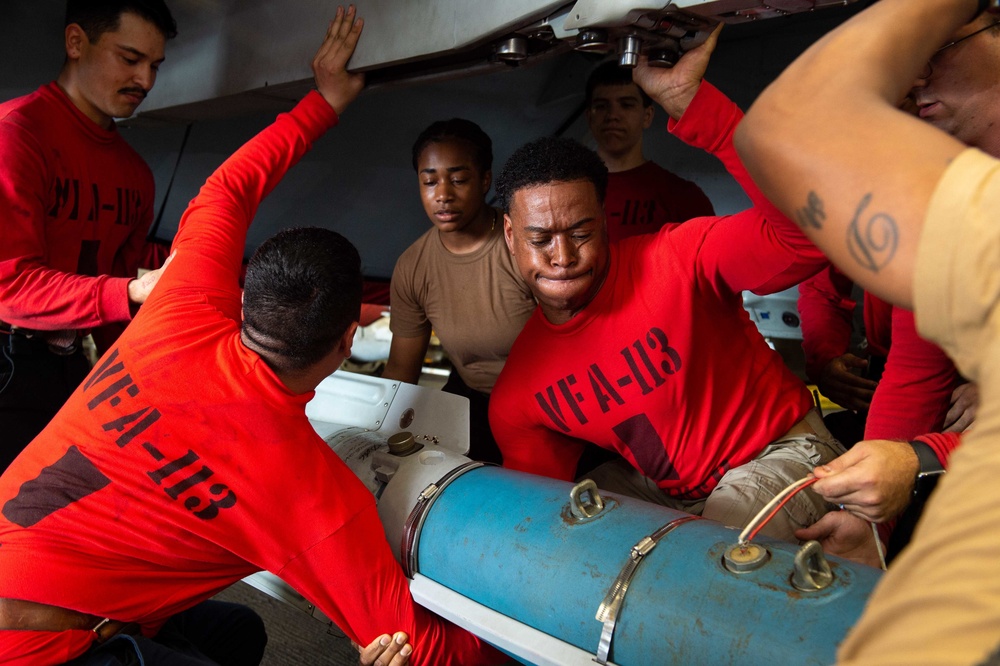 USS Carl Vinson (CVN 70) Sailors Load Ordnance in Philippine Sea