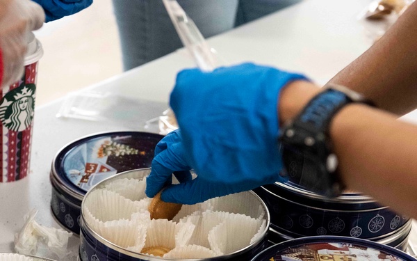 Andrews Spouses’ Club gives Airmen in dorms Mugs of Cheers