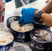 Andrews Spouses’ Club gives Airmen in dorms Mugs of Cheers