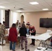 Andrews Spouses’ Club gives Airmen in dorms Mugs of Cheers