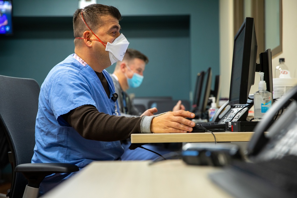 U.S. Army Doctors Assist with Patient Care at Spectrum Health Blodgett Hospital in Grand Rapids, Michigan.