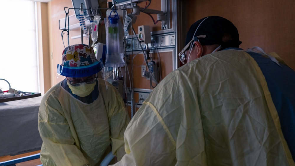 U.S. Army Officer Cares for Civilian Patients in Beaumont Hospital, Dearborn.
