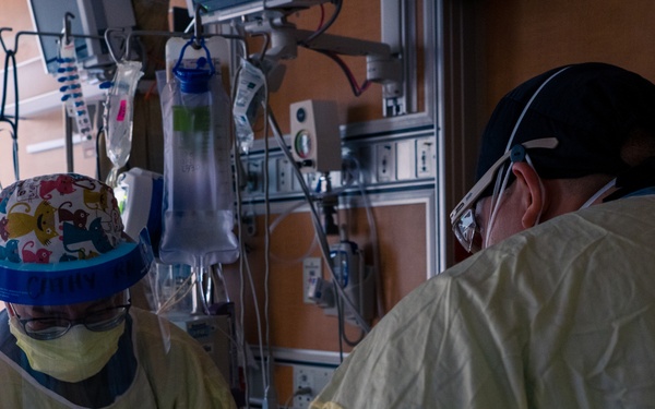 U.S. Army Officer Cares for Civilian Patients in Beaumont Hospital, Dearborn.