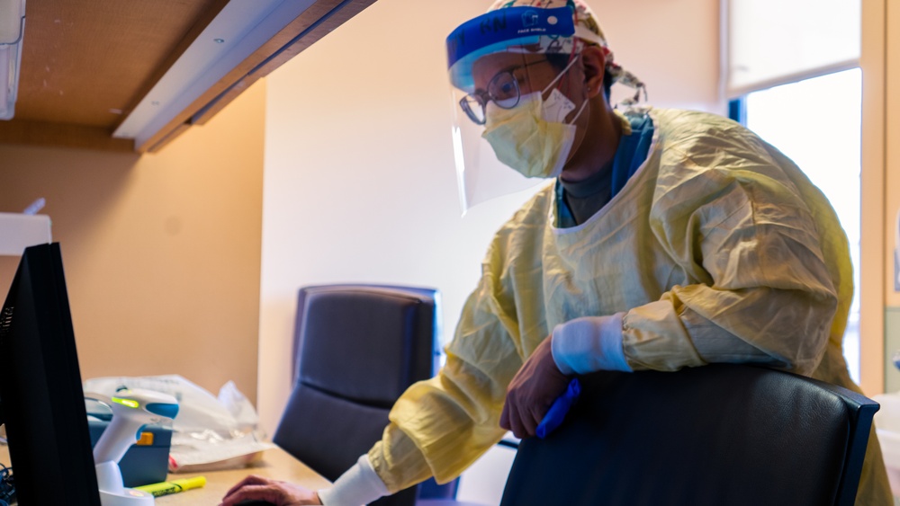 U.S. Army Officer Cares for Civilian Patients in Beaumont Hospital, Dearborn.
