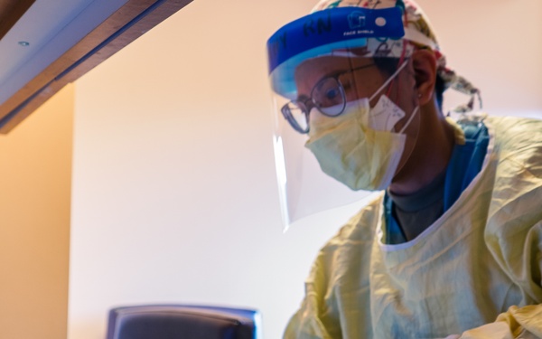 U.S. Army Officer Cares for Civilian Patients in Beaumont Hospital, Dearborn.