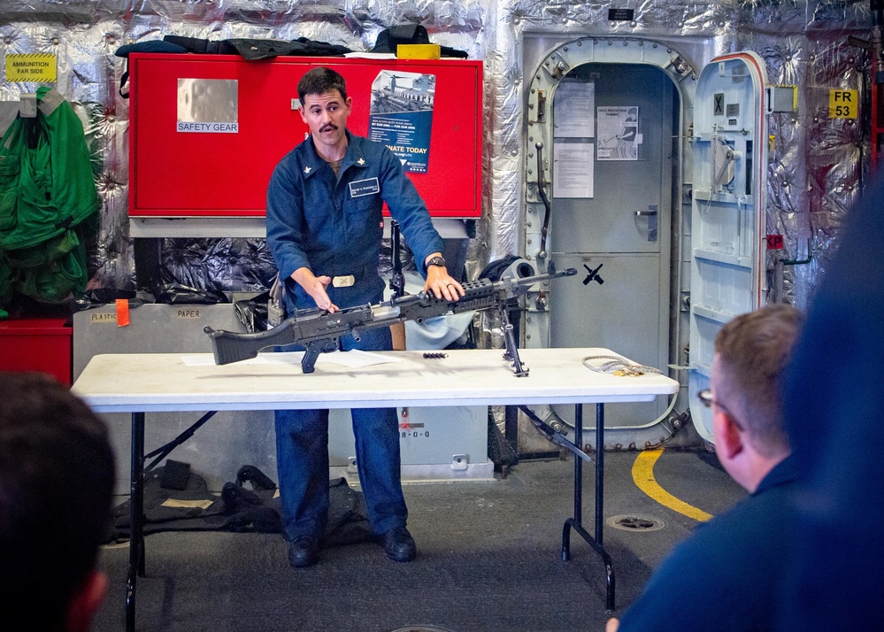 USS Charleston Sailor Conducts Training on M240B Machine Gun