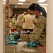 Afghan guests in-process through Task Force Liberty