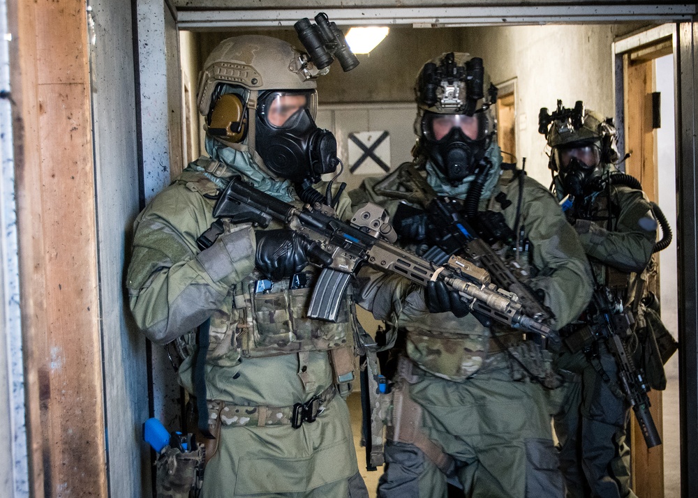 1st Battalion, 1st Special Forces Group (Airborne) train under simulated CBRN conditions