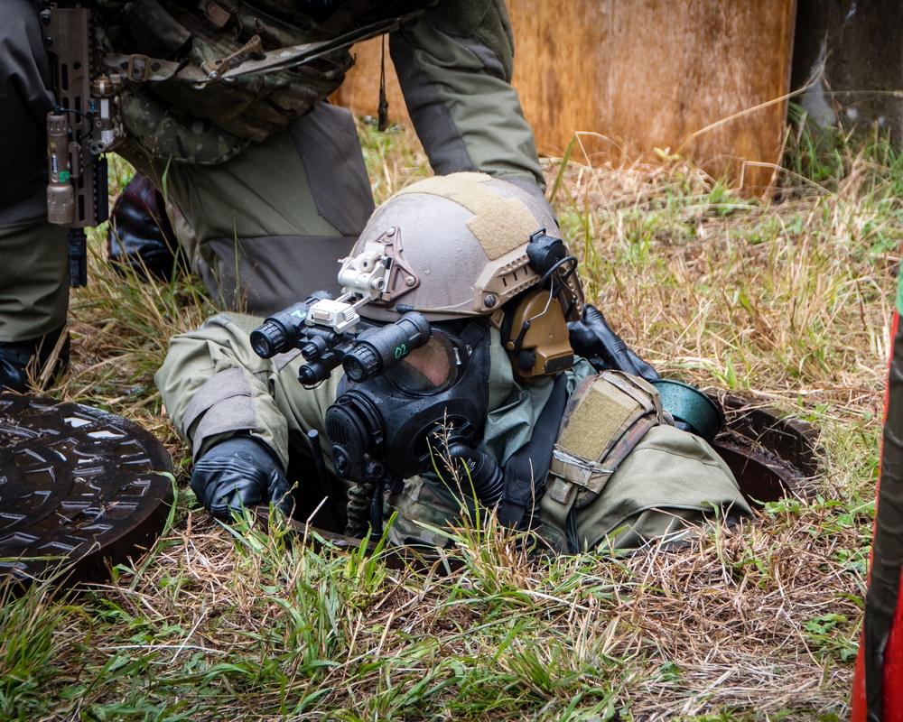 1st Battalion, 1st Special Forces Group (Airborne) train under simulated CBRN conditions