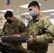 Task Force McCoy Soldiers Install Projectors in Afghan Evacuee Classrooms