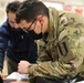 Task Force McCoy Soldiers Install Projectors in Afghan Evacuee Classrooms