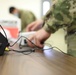 Task Force McCoy Soldiers Install Projectors in Afghan Evacuee Classrooms