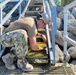 US Navy Seabees with NMCB- 5 repair a staircase for the locals in Marshall Islands