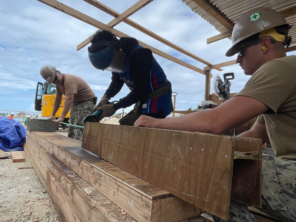 US Navy Seabees with NMCB- 5 instruct local Marshallese in Marshall Islands