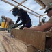 US Navy Seabees with NMCB- 5 instruct local Marshallese in Marshall Islands