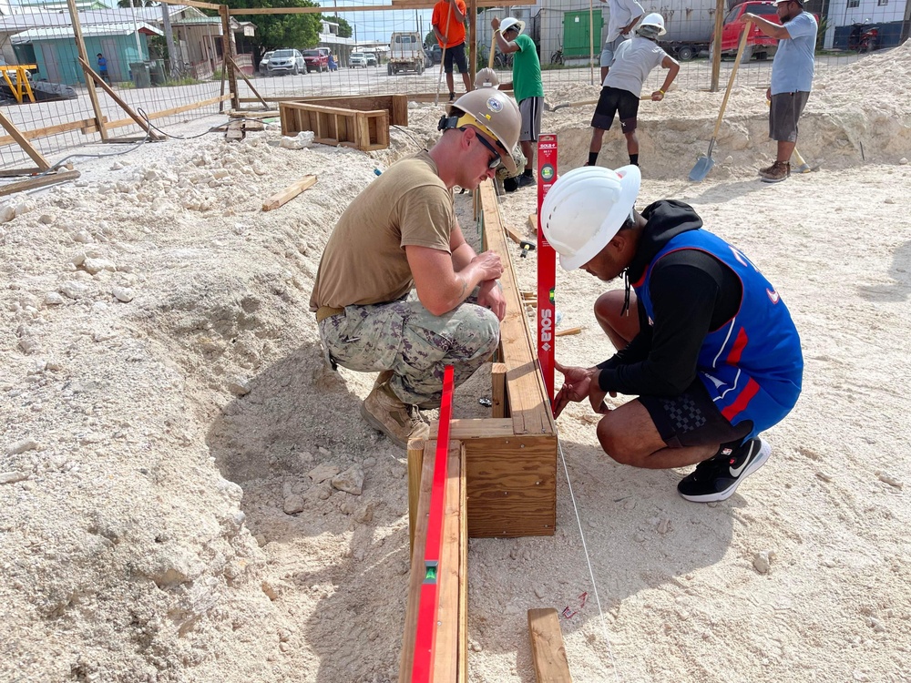 US Navy Seabees with NMCB- 5 instruct local Marshallese in Marshall Islands