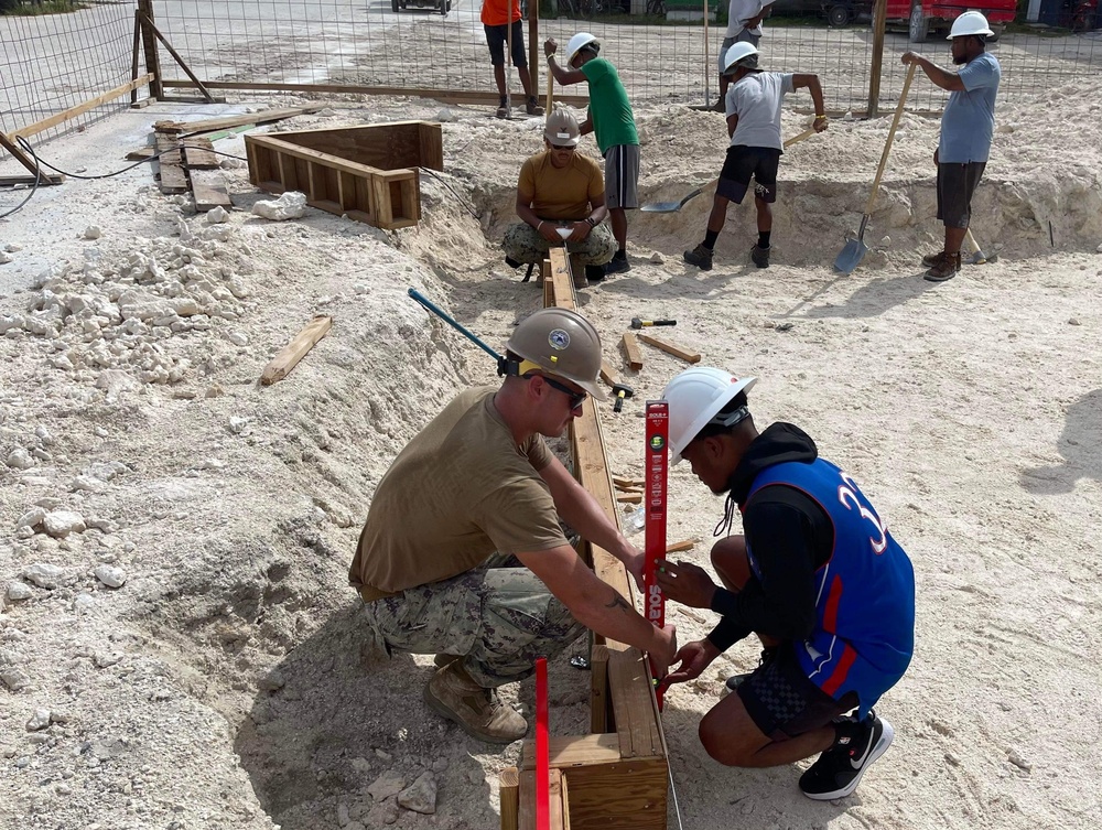 US Navy Seabees with NMCB- 5 instruct local Marshallese in Marshall Islands