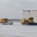 Air National Guard Heavy Equipment Operators remove snow