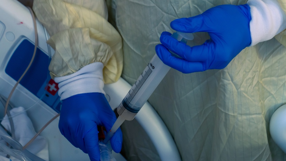 U.S. Army Officer Cares for Civilian Patient in Beaumont Hospital, Dearborn.