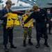 USS Carl Vinson (CVN 70) Sailors Participate in Abandon Ship Drill