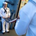 USS Charleston Sailor Participates in Evening Colors