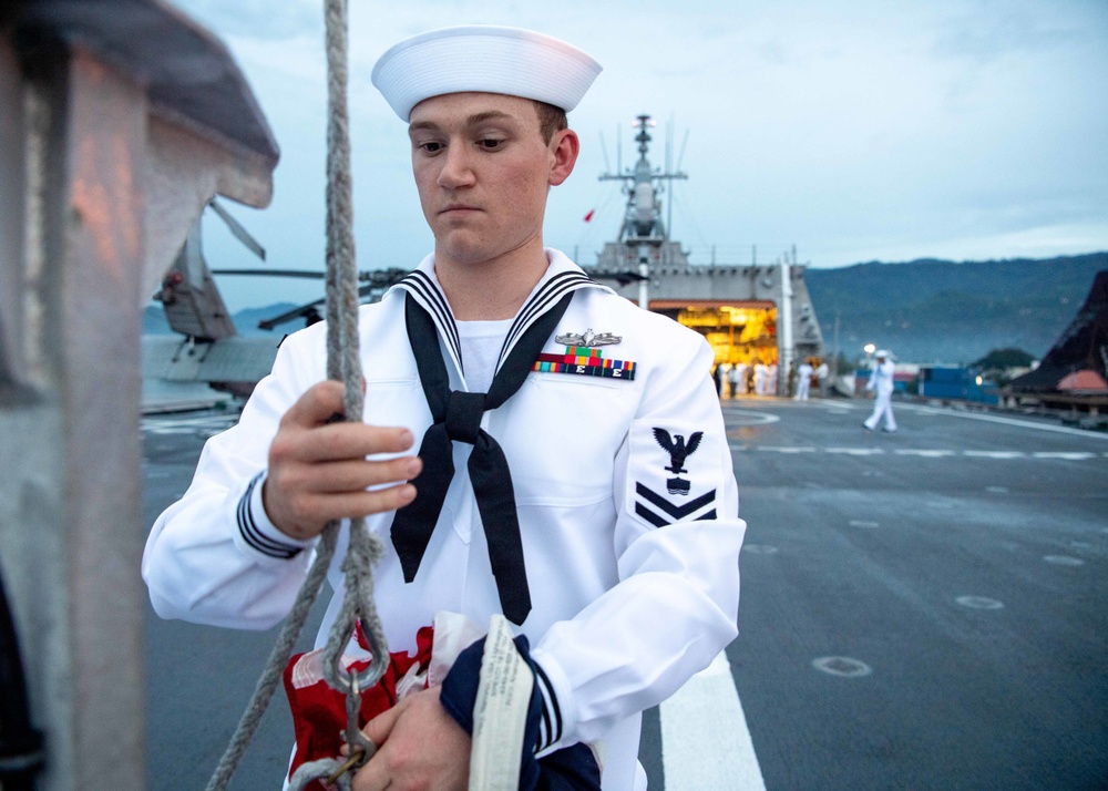 USS Charleston Sailor Participates in Evening Colors