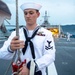 USS Charleston Sailor Participates in Evening Colors