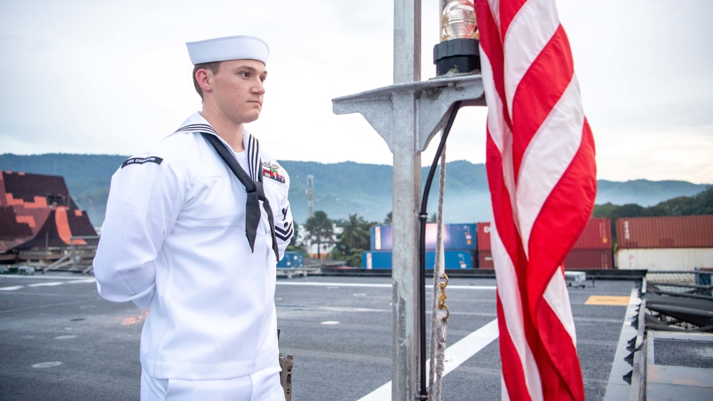 USS Charleston Sailor Participates in Evening Colors